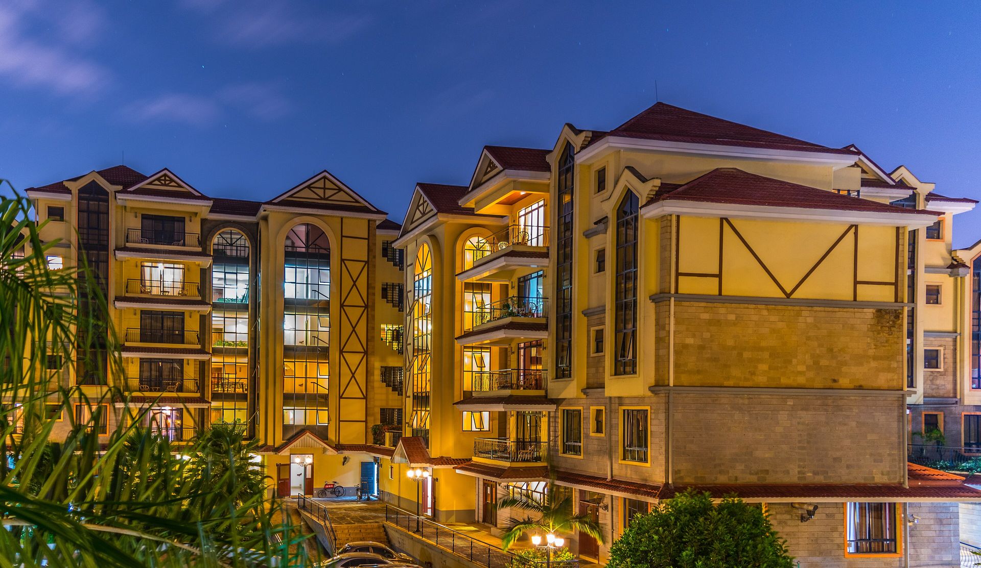 Lit-up residential apartment block in Kenya at dusk